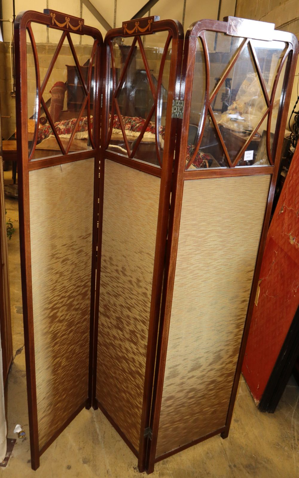 An Edwardian inlaid mahogany dressing screen, W.135cm, H.175cm